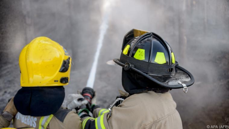 Viele Feuerwehren in Chile stehen derzeit im Dauereinsatz Foto: APA (AFP)