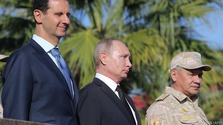 Putin bei seinem Syrien-Besuch am Dienstag. - Foto: APA (AFP)