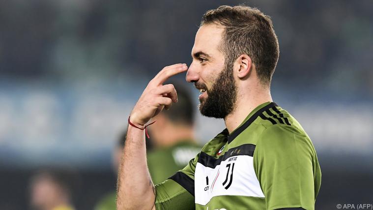 Juve-Stürmer Gonzalo Higuain fixierte den 2:0-Endstand. - Foto: APA (AFP)