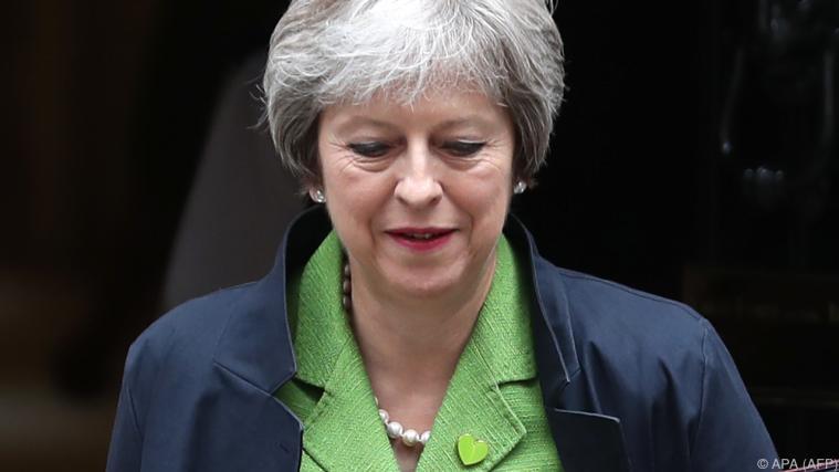 Theresa May konnte das Unheil noch abwenden. - Foto: APA (AFP)