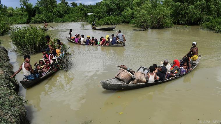 Ein Flüchtlingsboot kenterte auf dem Grenzfluss zwischen Myanmar und Bangladesch. - Foto: APA /AFP