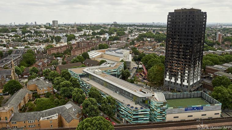 71 Personen starben beim Brand im Grenfell Tower. - Foto: APA/AFP