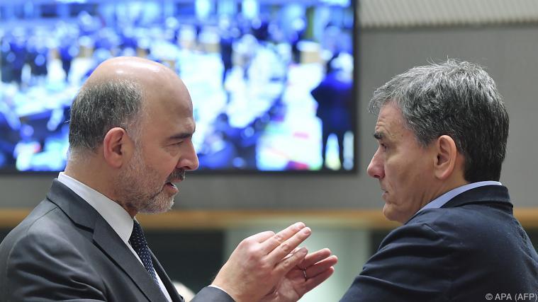 Moscovici (links) plädierte für ein "ambitioniertes" Eurozonen-Budget. - Foto: APA (AFP)