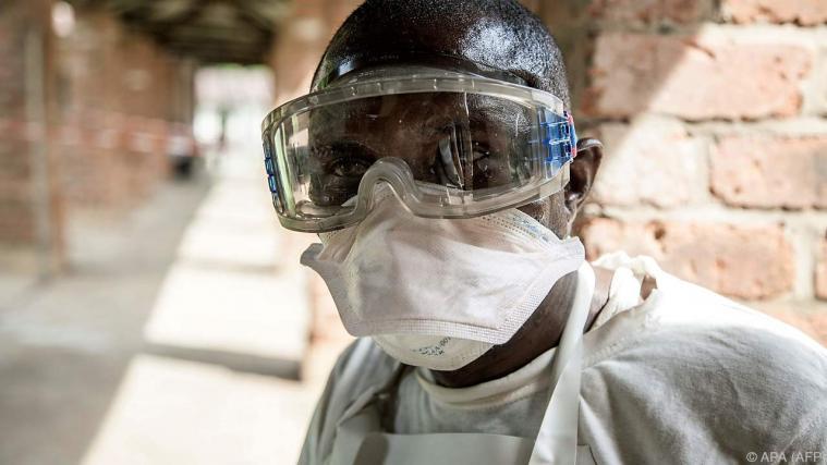 Helfer in einem Spital im Kongo Foto: APA (AFP)