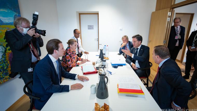 Vertreter der "Sparsamen Vier" unter sich.