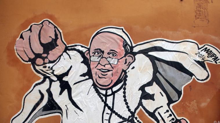 Papst Franziskus als Wandsticker an einer römischen Hauswand 2014.