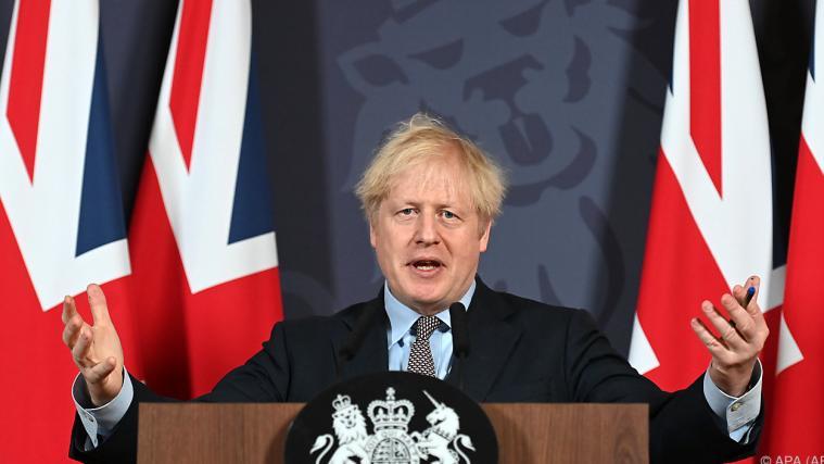 Premier Johnson in einer Pressekonferenz am Heiligen Abend.