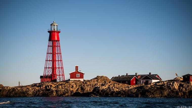 Filmfestival mit nur einer Besucherin auf einem Leuchtturm.