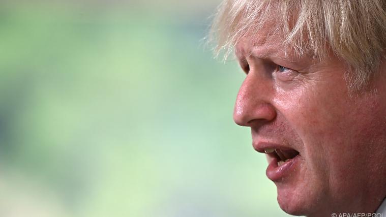Premierminister Johnson musste geplante Lockerungen verschieben.